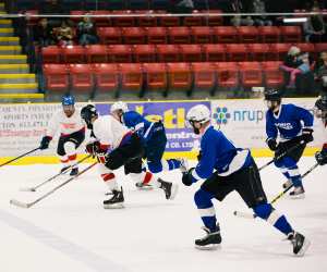 Hockey players at the Barn Burner all-star hockey game in Prince Edward County