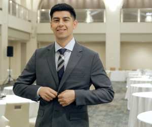 Arcadian Court | Events manager Daniel Vergara buttons up his suit at event venue Arcadian in Toronto