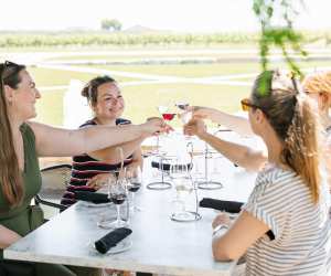 A group of people enjoying wine at Trius Winery Restaurant