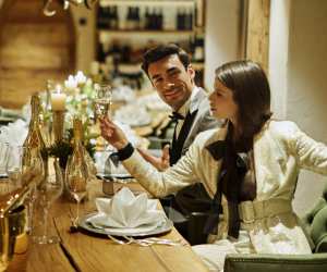 Bottega Gold | A group of friends enjoy Bottega Gold over a dinner table