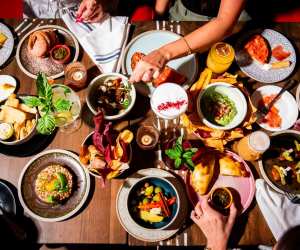 Oliver & Bonacini gift cards | An overhead shot of food and drinks at Ceci Bar