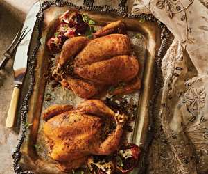 3 tasty Middle Eastern recipes | Two chickens on a platter in Thuraya cookbook