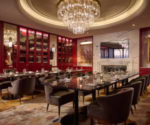 A chandelier hangs over the dining area at Frenchy Bar et Brasserie