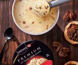 Chapman's Ice Cream | An ice cream scooper scoops Chapman's Pecan Butter Tart Premium Ice Cream