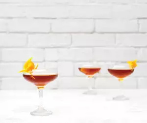 A stiff drink recipe with rum and vermouth.