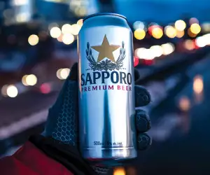 The best beer for the holidays | Sapporo with twinkly city lights