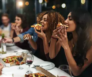 Fine Dining Lovers The Dining Out Survey | Women eating pizza