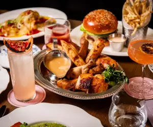 La Plume Toronto | A spread of dishes at La Plume in The Well