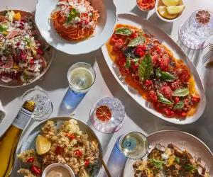 A spread of dishes at Figo Toronto