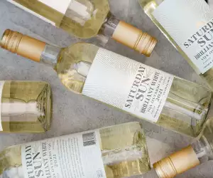 Bottles of Saturday Sun Brilliant White Harvest VQA