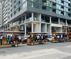 Pedal Pubs lined up on a Toronto street