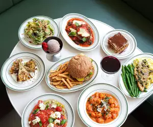A spread of burger and fries, pasta, tiramisu and more on Stefano's Diner's summer prix fixe menu
